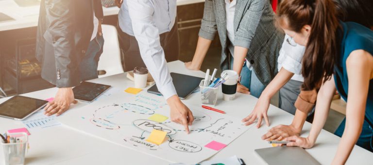 Businesspeople working on a new product