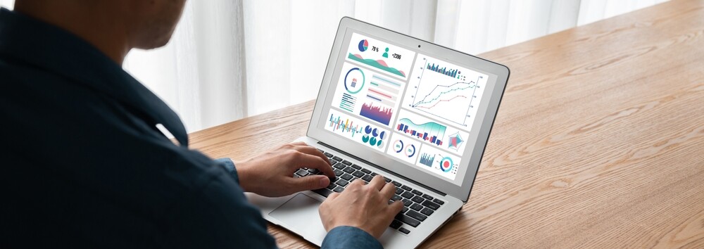 A business intelligence dashboard on a laptop