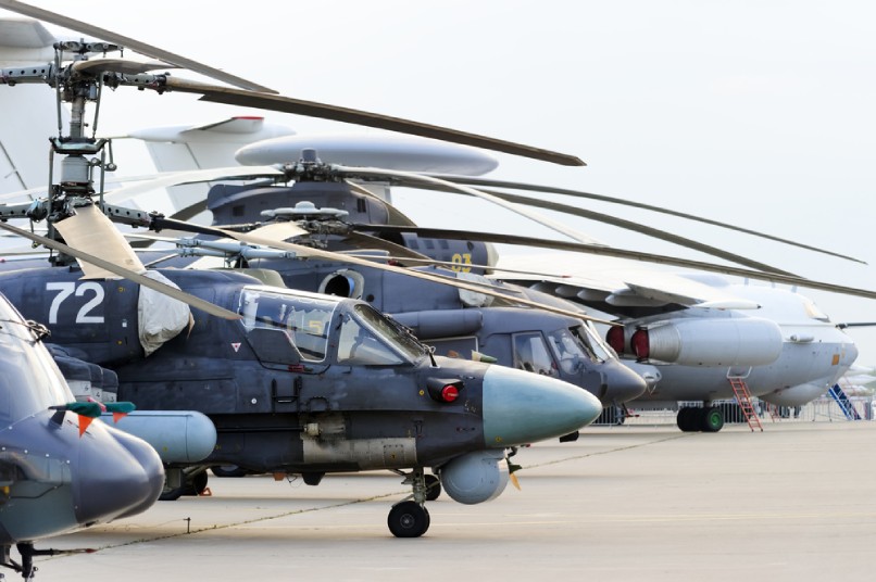 Military helicopters in a row
