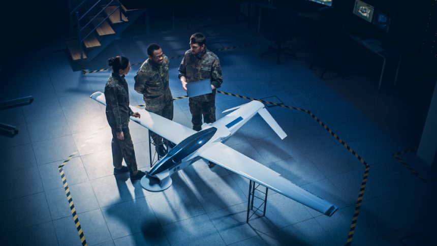 Aerospace engineers working on a drone