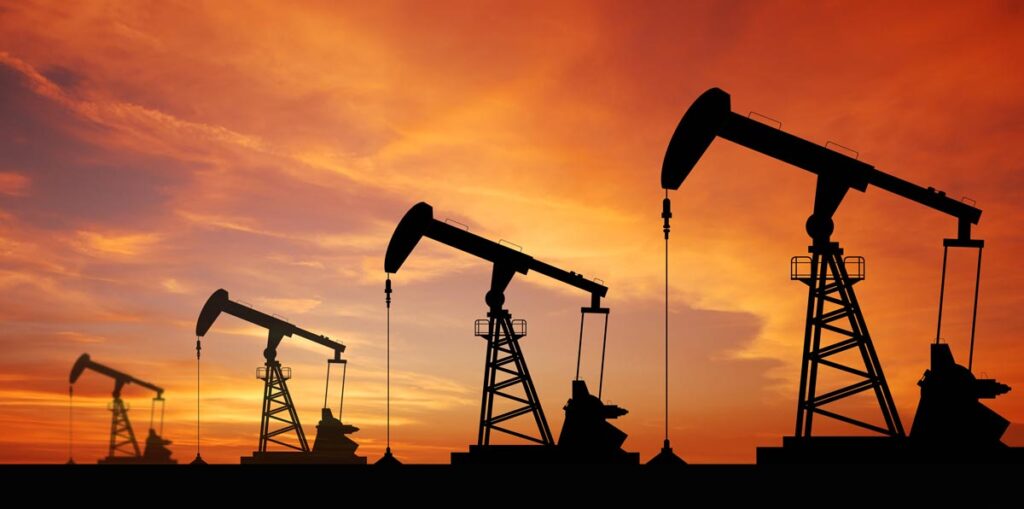 Oil wells in the sunset