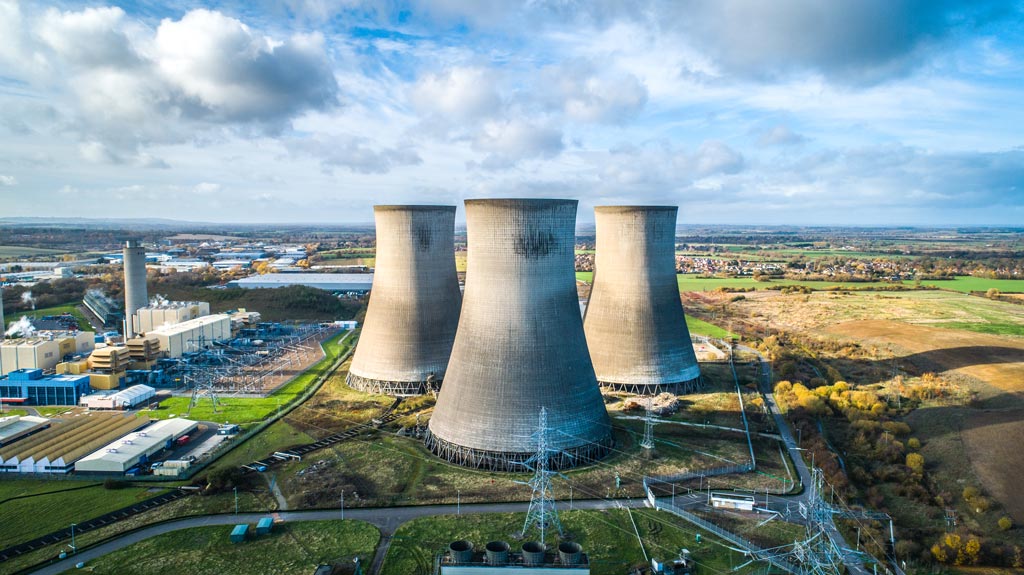 Three cooling towers at a nuclear power plant