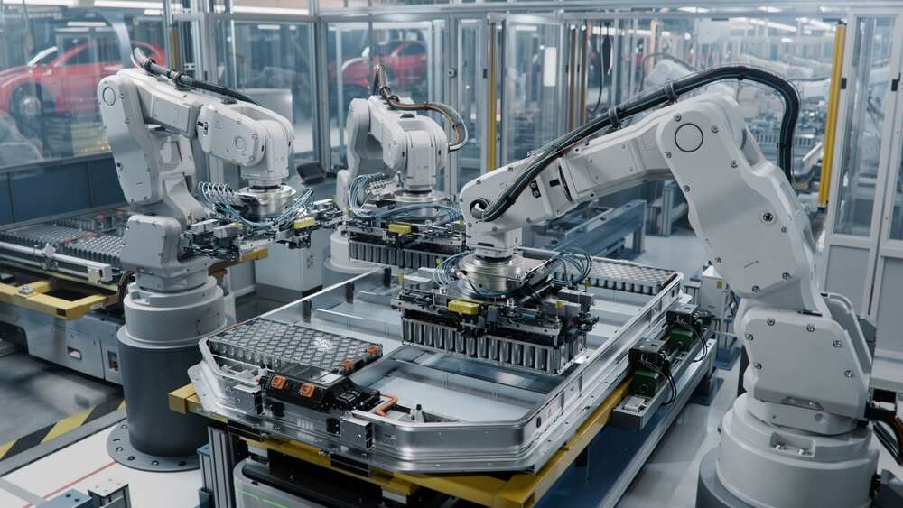 Robotic arms in a manufacturing line