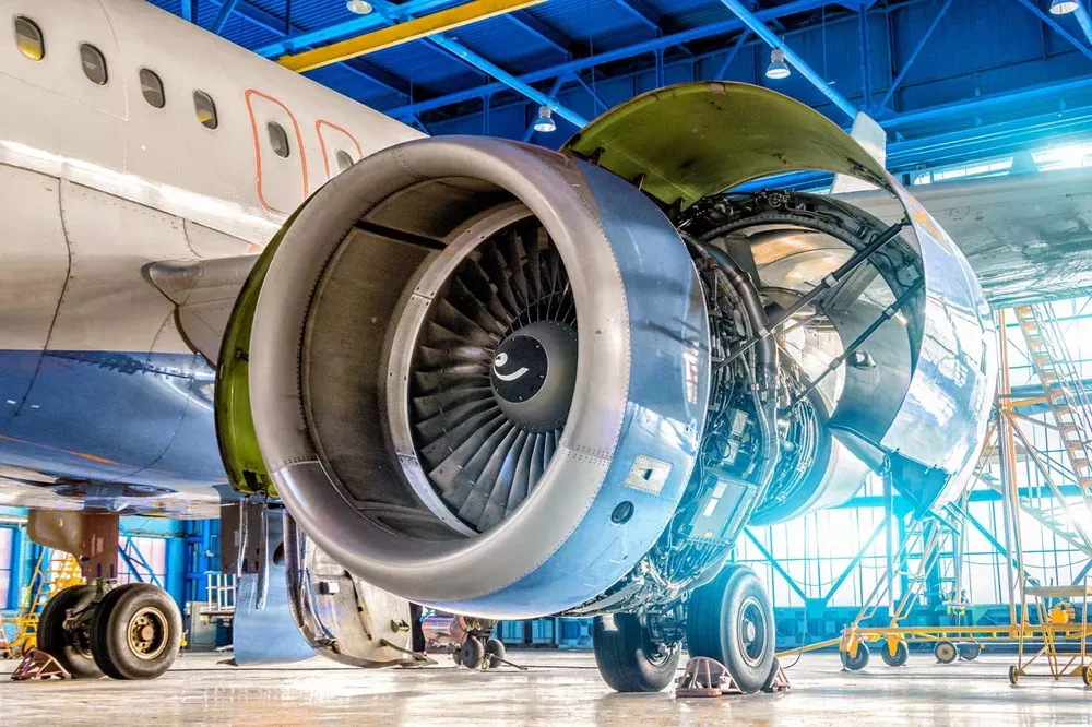 A jet engine opened up and being worked on
