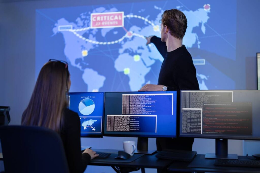 A cybersecurity team in an operations center.