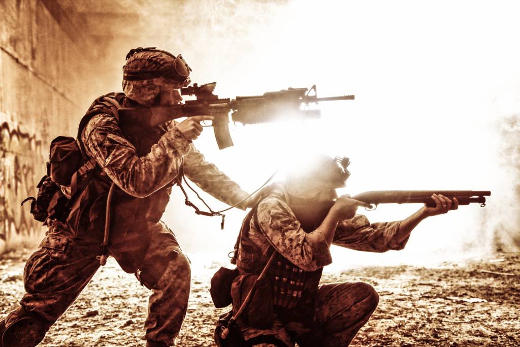 Two marines in combat.