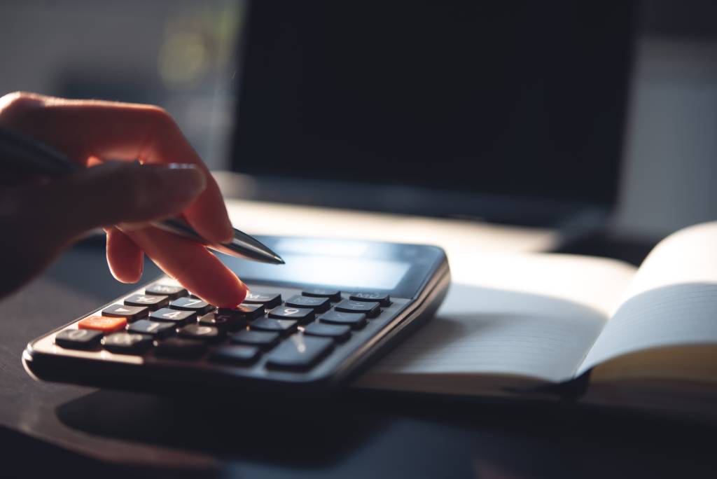 An accountant using a calculator.