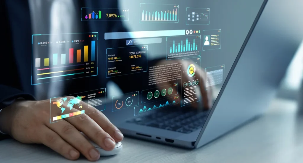 A man reading data on his laptop.